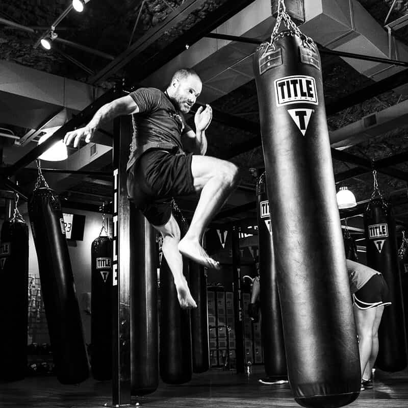 Mixed Martial Arts Lessons for Adults in Mundelein IL - Flying Knee Black and White MMA